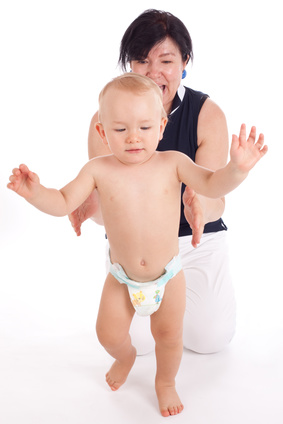 Baby making his first steps