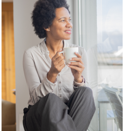 Person thinking with a cup of tea
